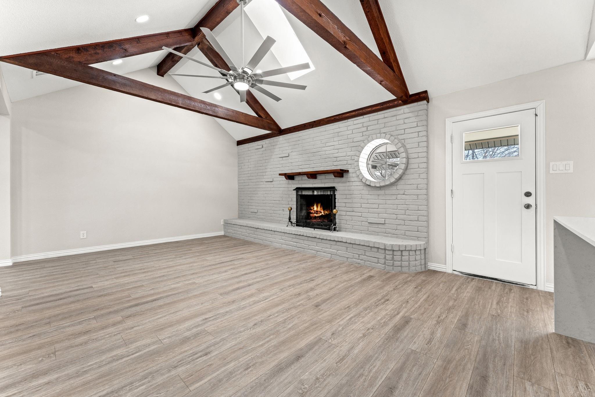 wood beam installation on a ceiling by an expert general contractor in Royse City, TX.