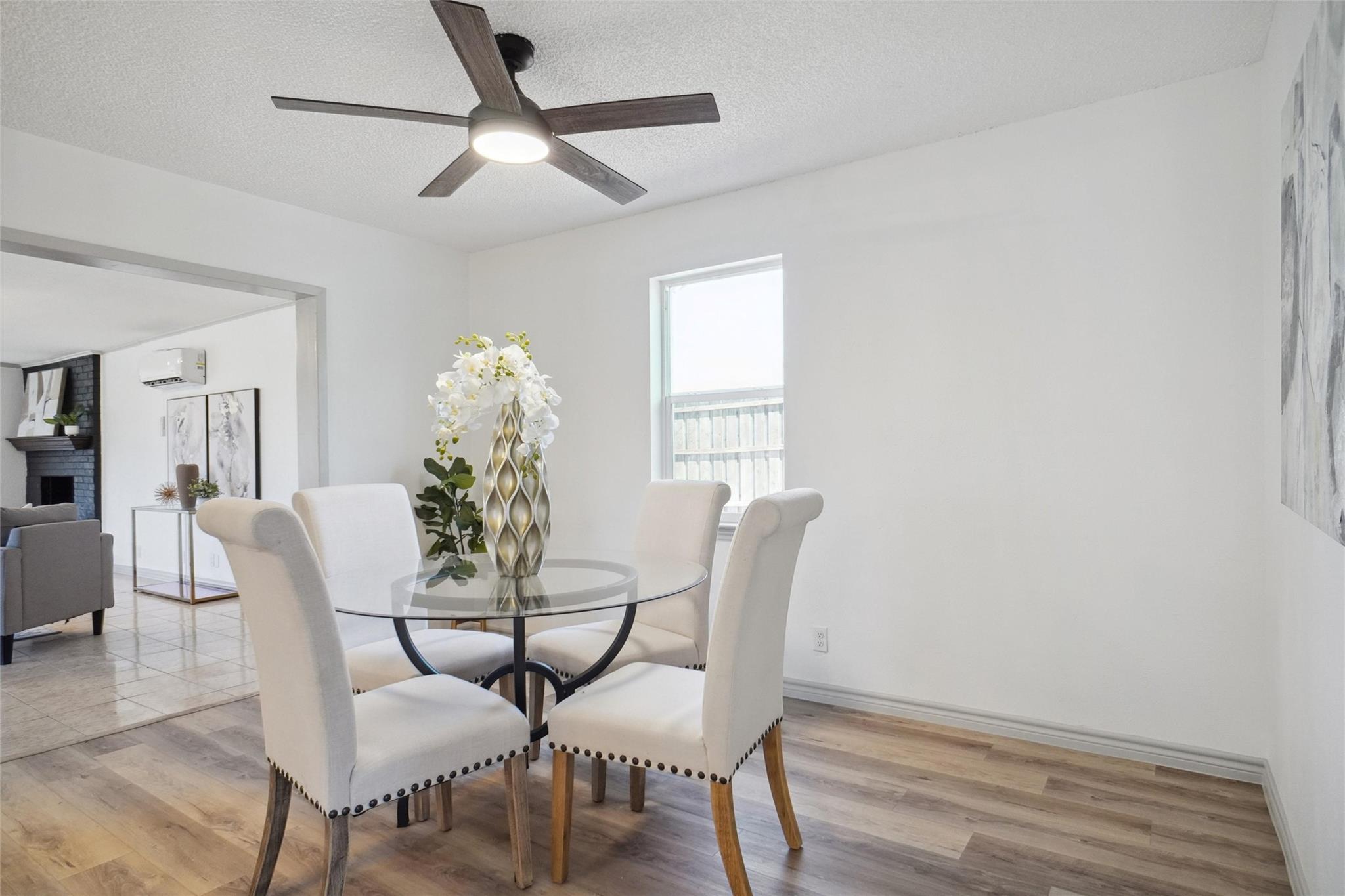 remodeled dining area next to a newly remodeled kitchen in Royse City by a professional general contractor.